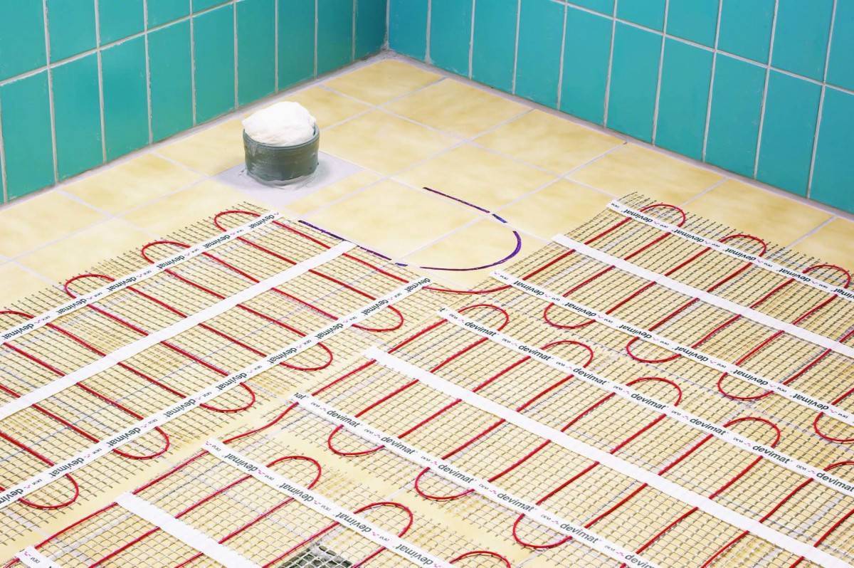 Теплый пол под плитку электрический — какой лучше?