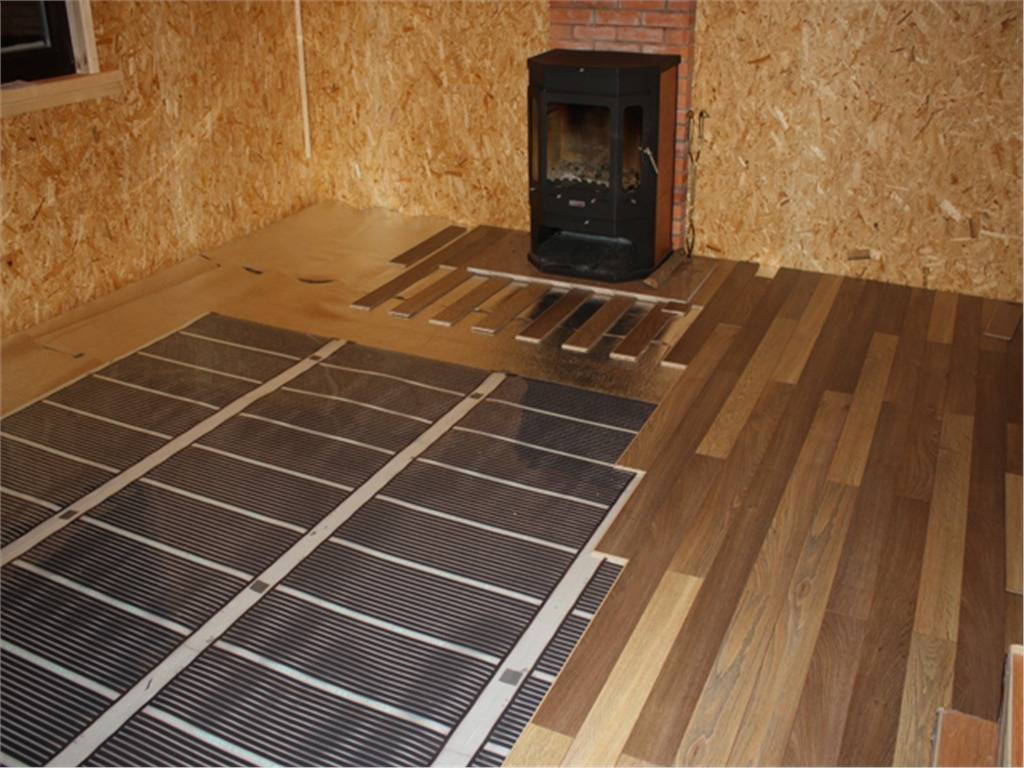 Теплый пол под ламинат на деревянный пол: какой лучше ложить?